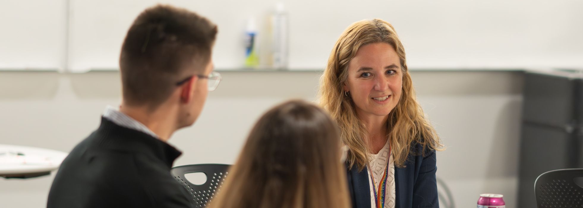 Laura Maursetter and two other people sitting at a table