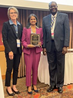 Dr. Shobhina Chheda, center, with current ACP president Ann Maguire, MD, MPH, on the left, and ACP past president Isaac Opole, MD, PhD, on right.
