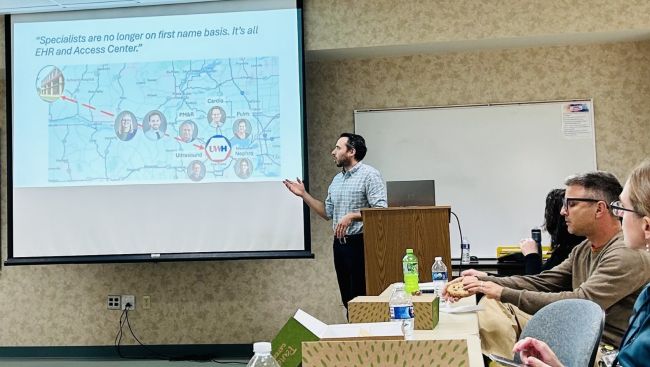 Dr. Justin Levinson discusses rural rheumatology service needs at a STARS-R planning session in 2024.