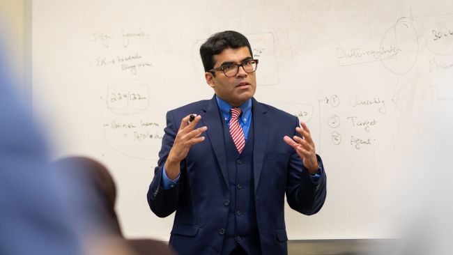 Dr. Fahad Aziz in the classroom.