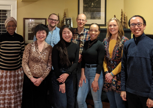 Group photo of Dr. Tim Kamp's research team at a house gathering
