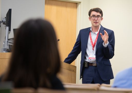 Michael Scolarici delivers an ID Grand Rounds