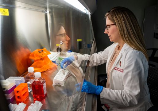 Hilary Faust, MD, MS, in the lab.