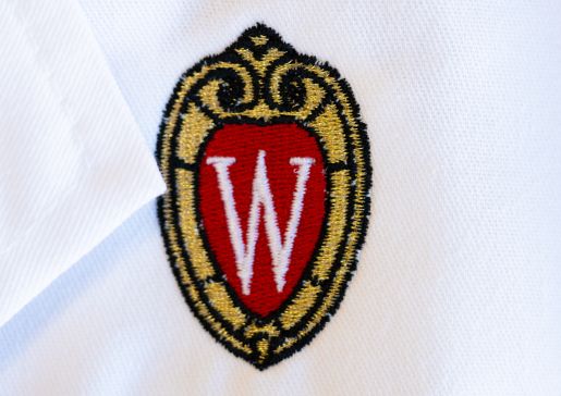 White coat with embroidered UW crest